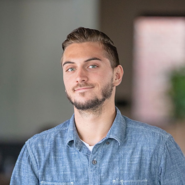 Anthony Burket's headshot photo.