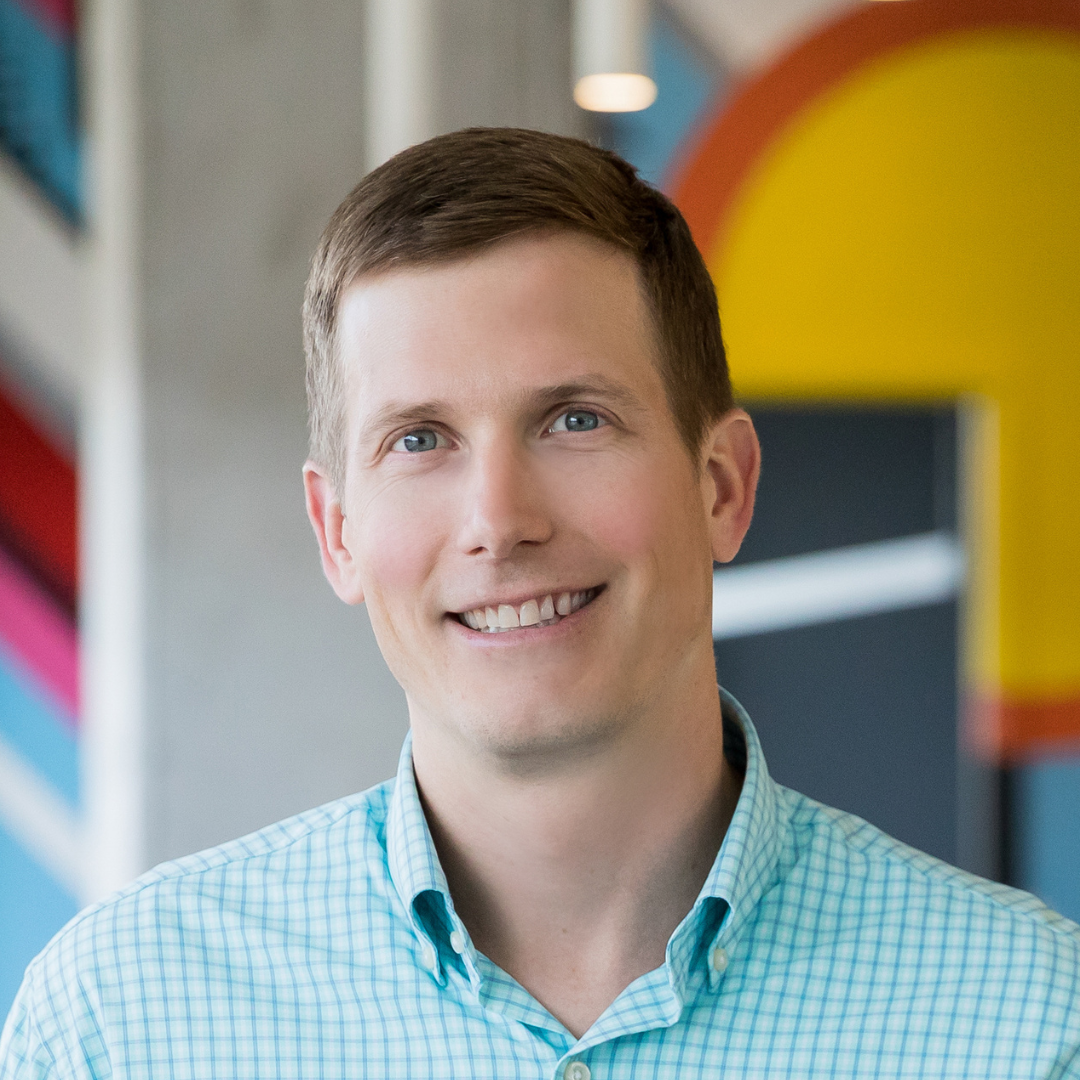 Portrait of Andrew Miller, Co-Founder and VP of Client Services at Workshop Digital.