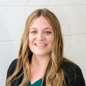 Morgan Jarvis smiling in professional headshot.